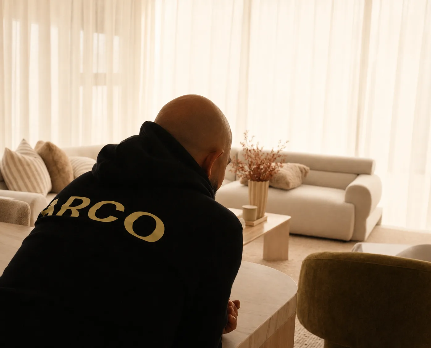 An ARCO team member in a completed living room