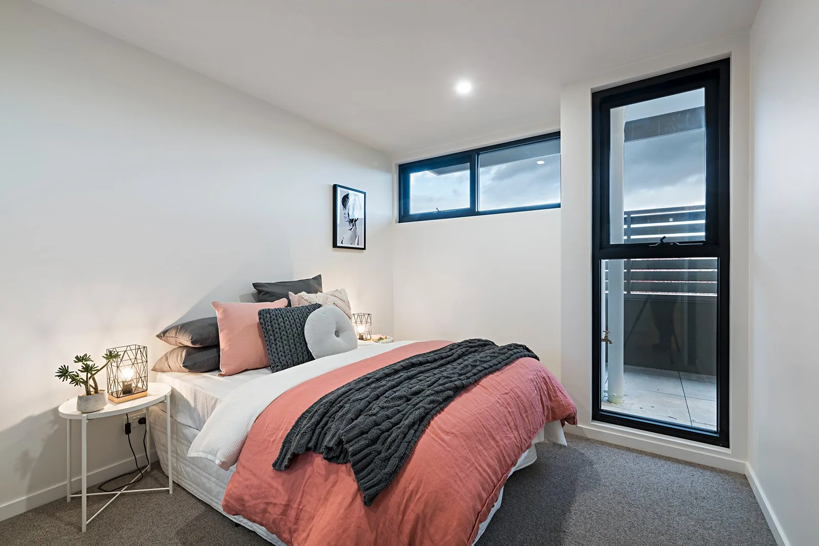 The Elm, Moonee Ponds: bedroom with feature window and balcony access