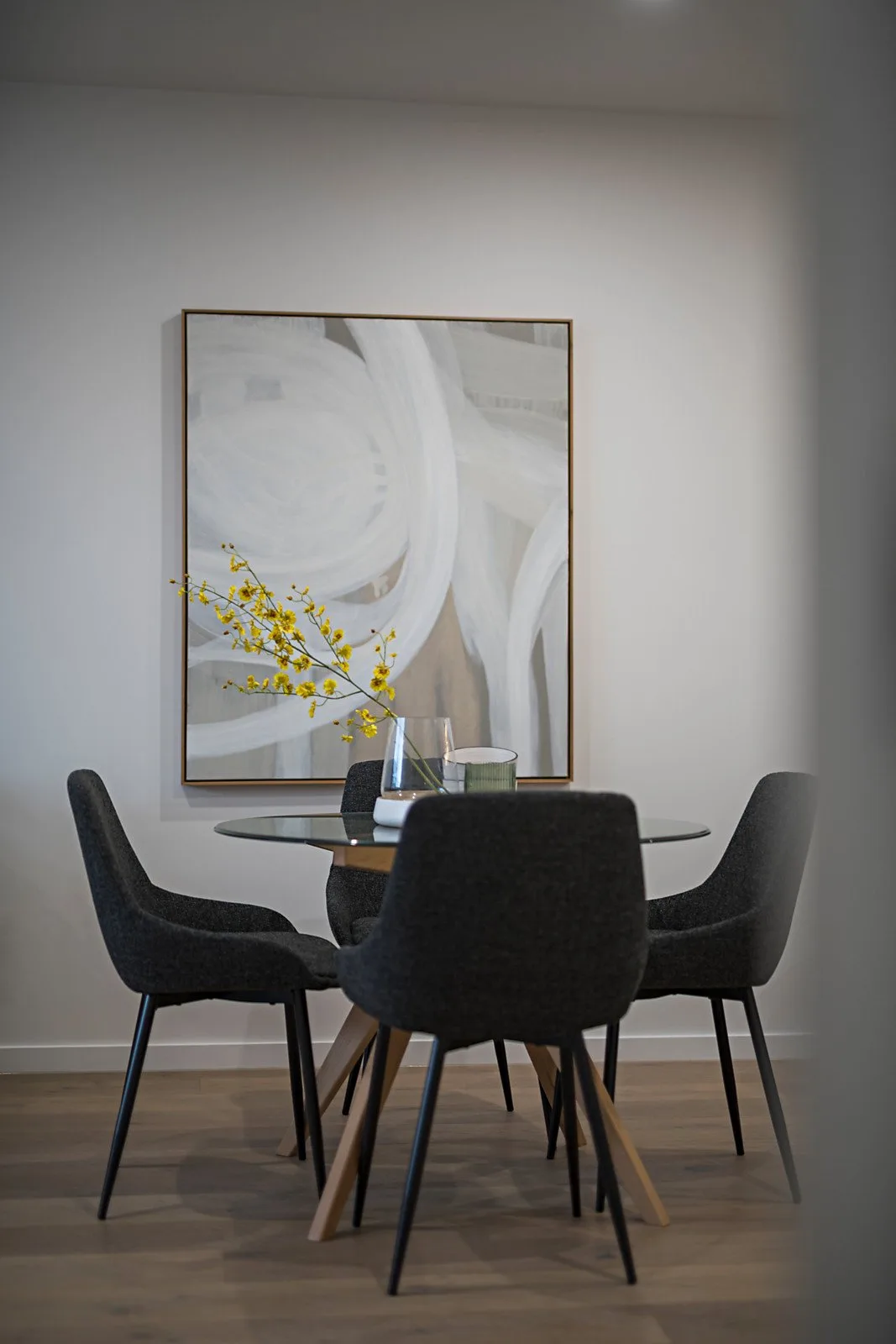 The Elm, Moonee Ponds: dining setting beside feature artwork